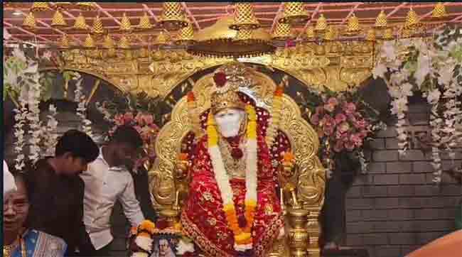 ढोल ताशांच्या गजरात साई बाबांच्या मिरवणुकीची पेण शहरात परिक्रमा