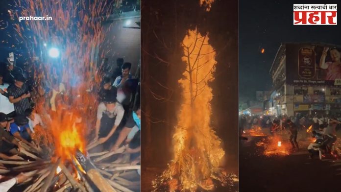 Savarde Holi : सावर्डे येथील अंगावर जळकी लाकडं फेकण्याची परंपरा नेमकी काय ?