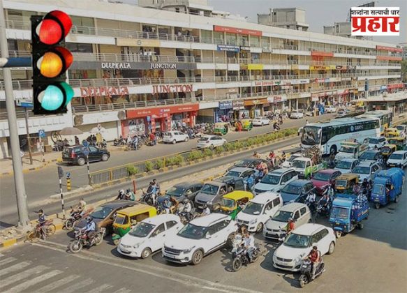 Nashik News : नाशिककरांची उन्हाच्या चटक्यांमुळे सिग्नलवर थांबण्याची दमछाक! 